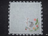 A napkin with an Easter motif, hand-embroidered and finished with handmade lace (kz-4)